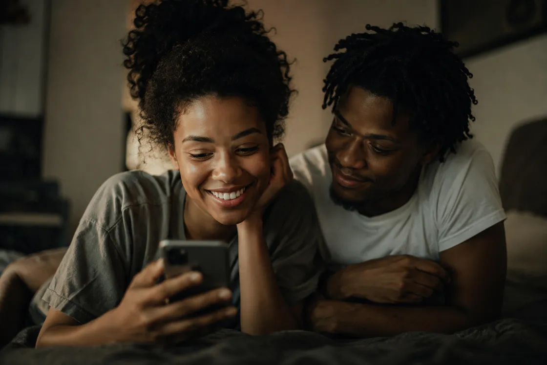 Two people sharing a private conversation